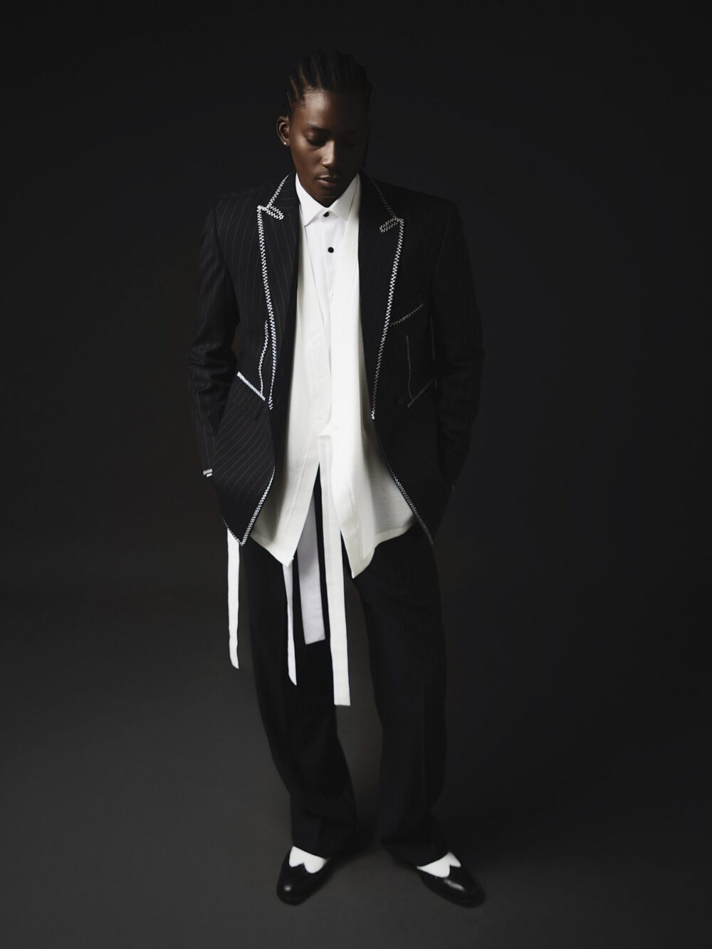 PINSTRIPED SUIT WITH THREADING DETAILING